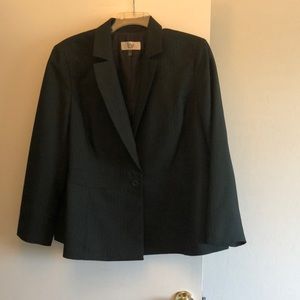 Green suit with subtle stripes